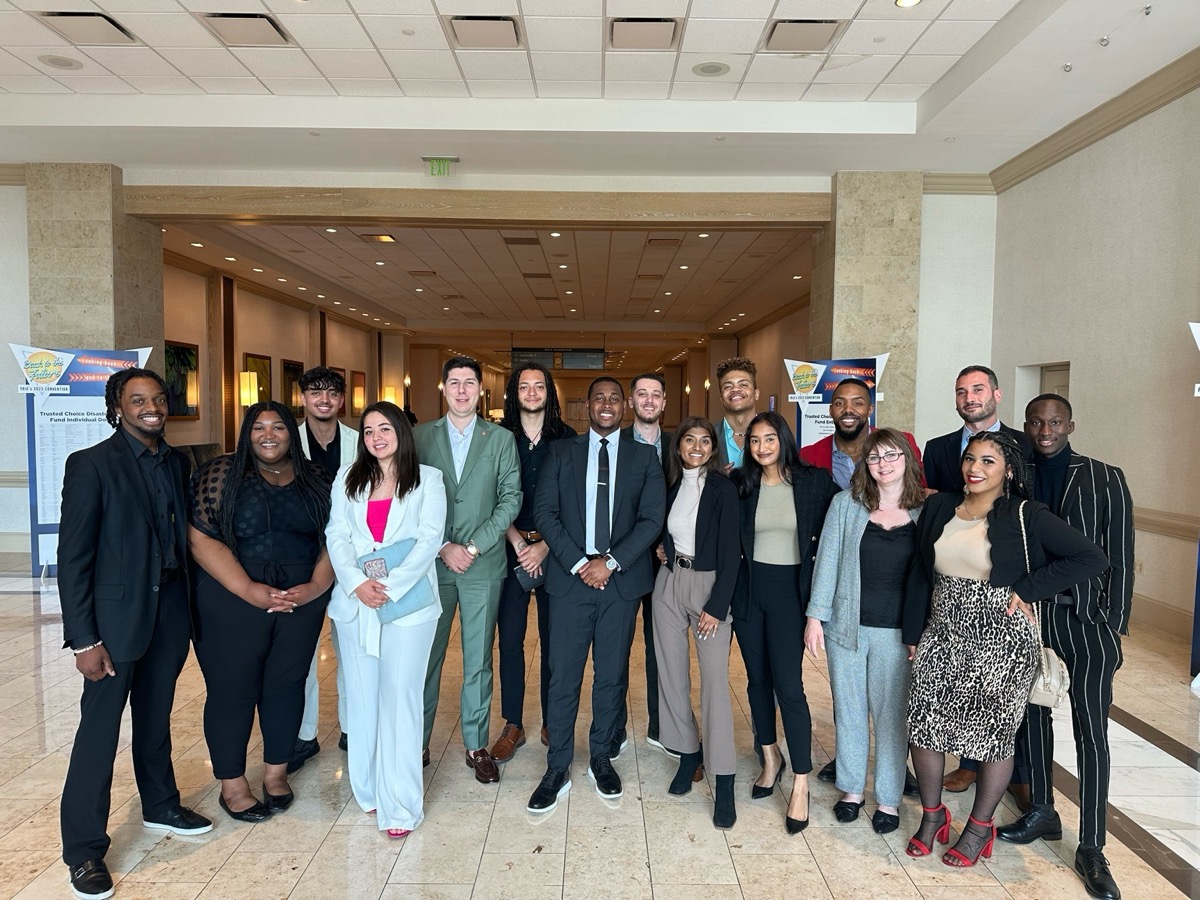 One Way Empire Inc. team members in a professional setting